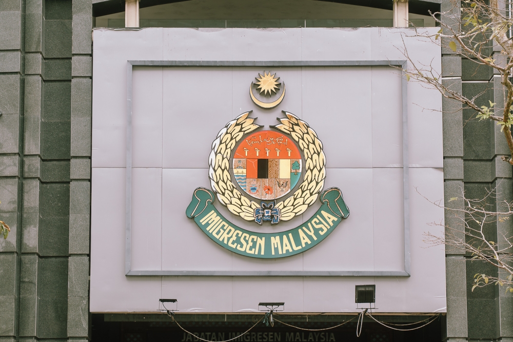 Immigration Department Dismantles Passport Forgery Ring in Kuala Lumpur, Arrests Three and Recovers 119 Fraudulent Documents