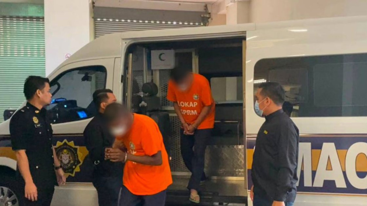 Two highway officers remanded in custody over alleged acceptance of traffic bribes on East Coast Expressway