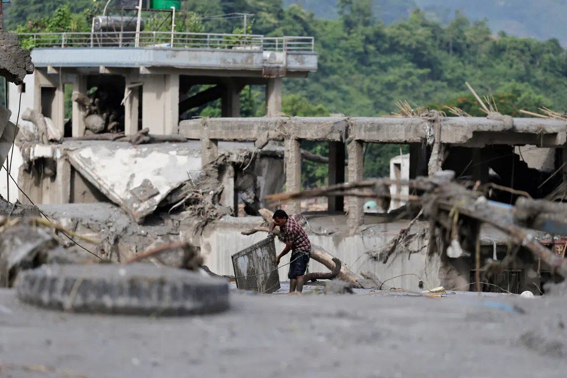 Nepal and China brace for secondary flooding threat as glacier-collapse lakes risk catastrophic overflow