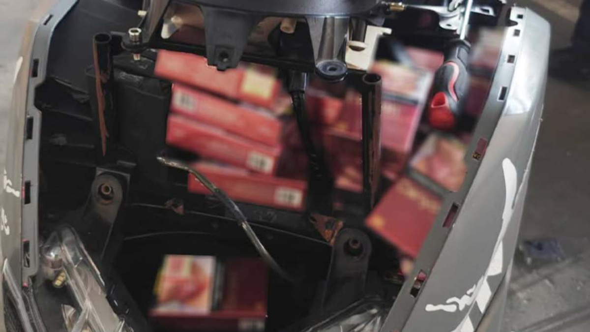 Woman detained at Johor-Singapore border after 400 cigarette packets discovered hidden in motorcycle