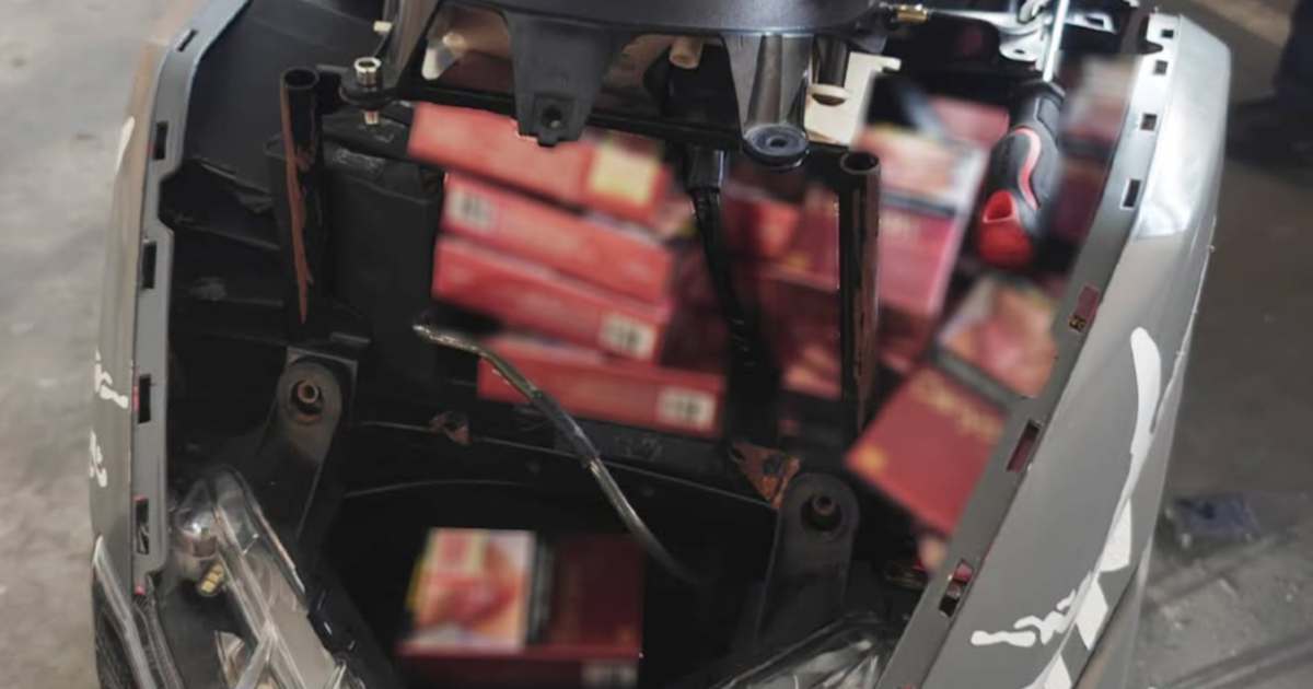 Woman detained at Johor-Singapore border after 400 cigarette packets discovered hidden in motorcycle