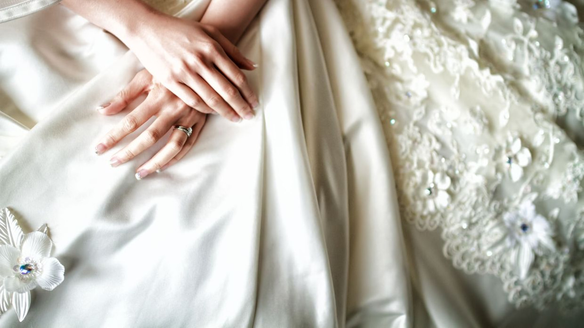 Beyond the Wardrobe: Why Handing Down—or Letting Go—of Wedding Dresses Matters