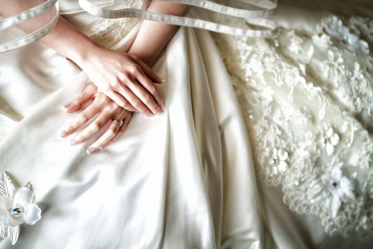 Beyond the Wardrobe: Why Handing Down—or Letting Go—of Wedding Dresses Matters