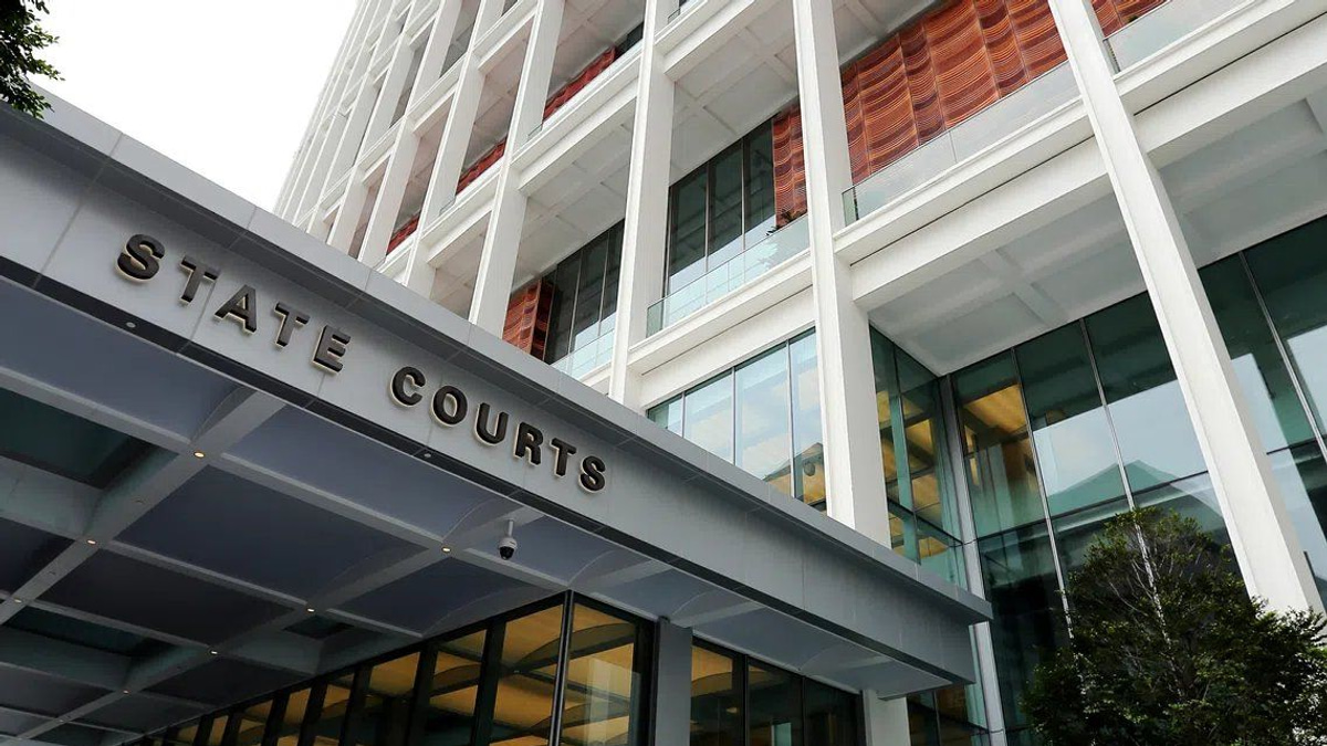 Singapore woman charged in S$32 million luxury goods scandal after handling proceeds from scam