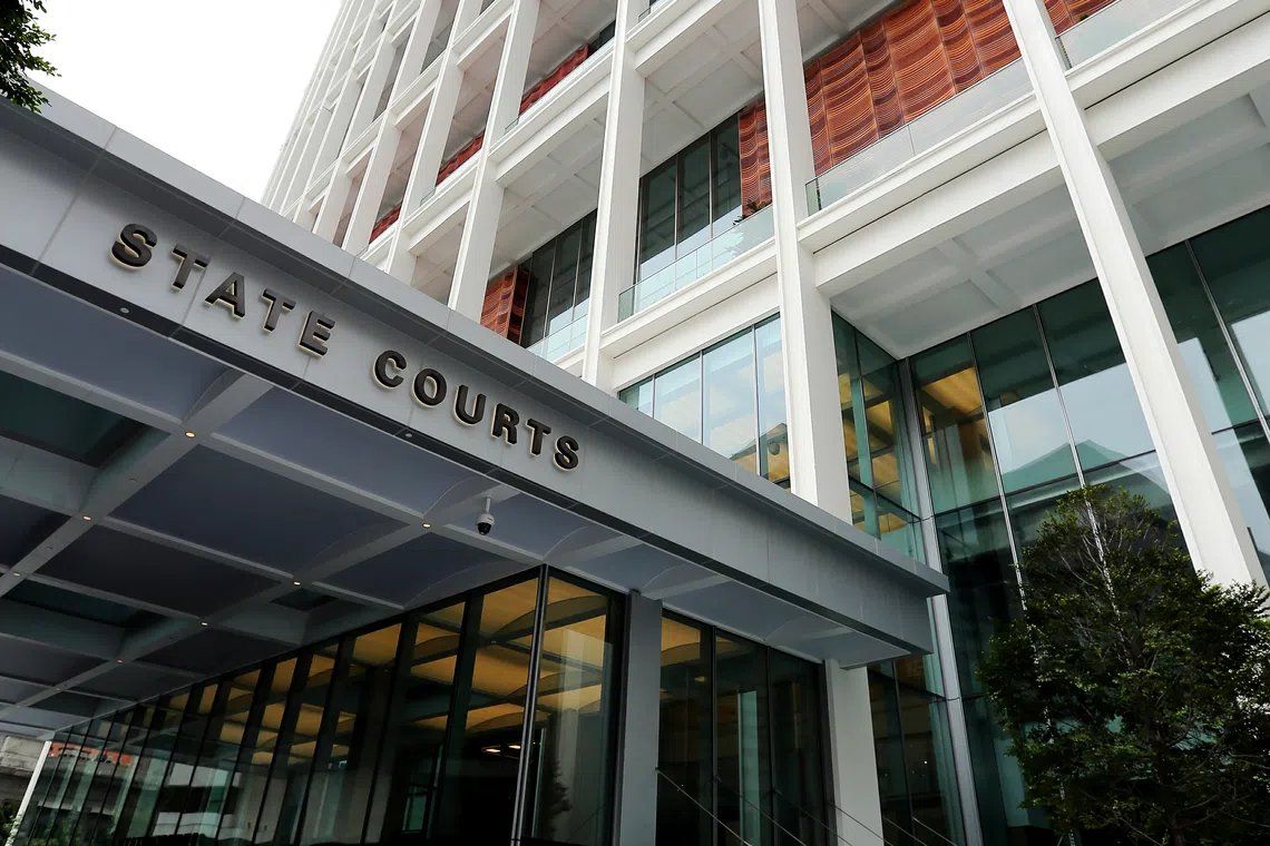 Singapore woman charged in S$32 million luxury goods scandal after handling proceeds from scam