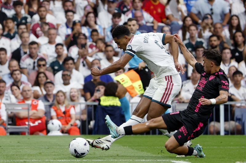 Real Madrid sweep past Malaga 4-0 to extend unbeaten run at top of LaLiga