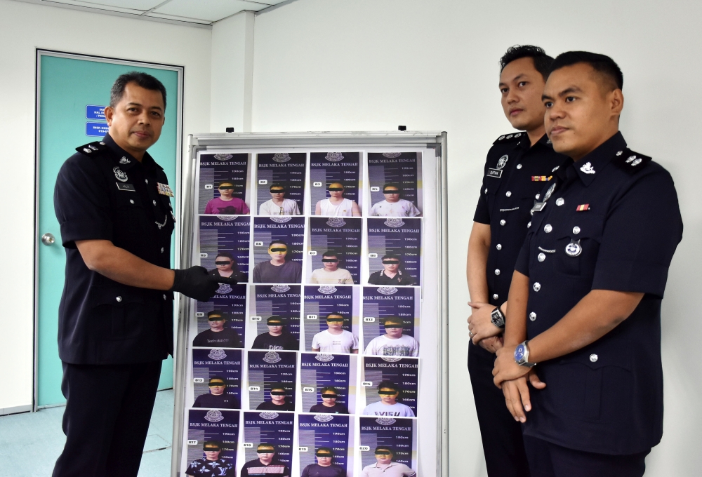 Police Dismantle Sprawling Investment Fraud Racket Operating from Melaka, Arresting 21 Chinese Nationals