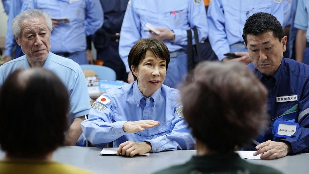 Japan's PM visits earthquake-stricken Kumamoto as recovery battle intensifies amid extreme heat