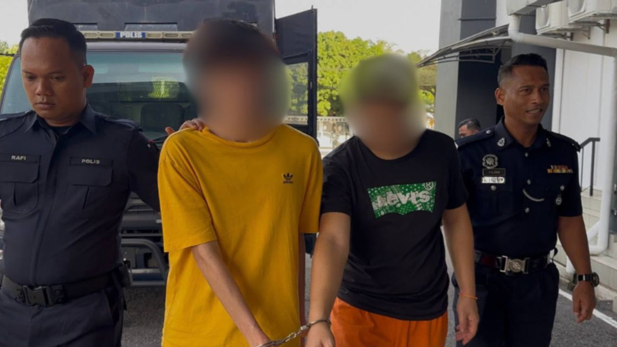 Two arrested in connection with death of man found netted in Johor river