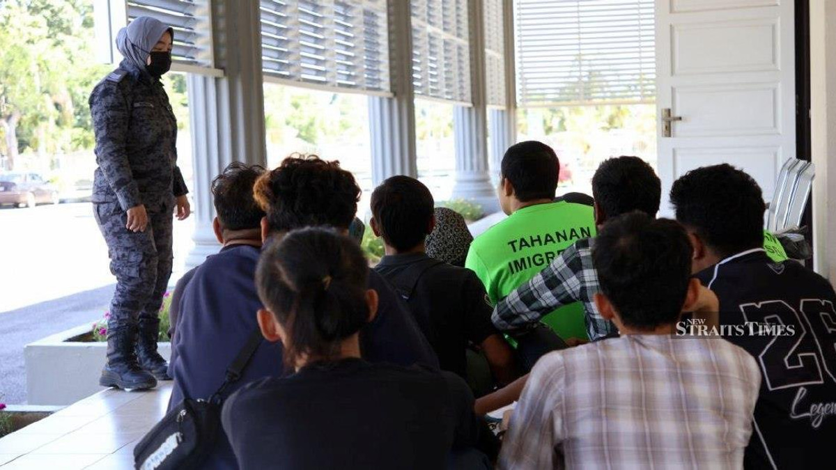 Ten undocumented migrants face court charges over illegal entry and overstaying in Malaysia