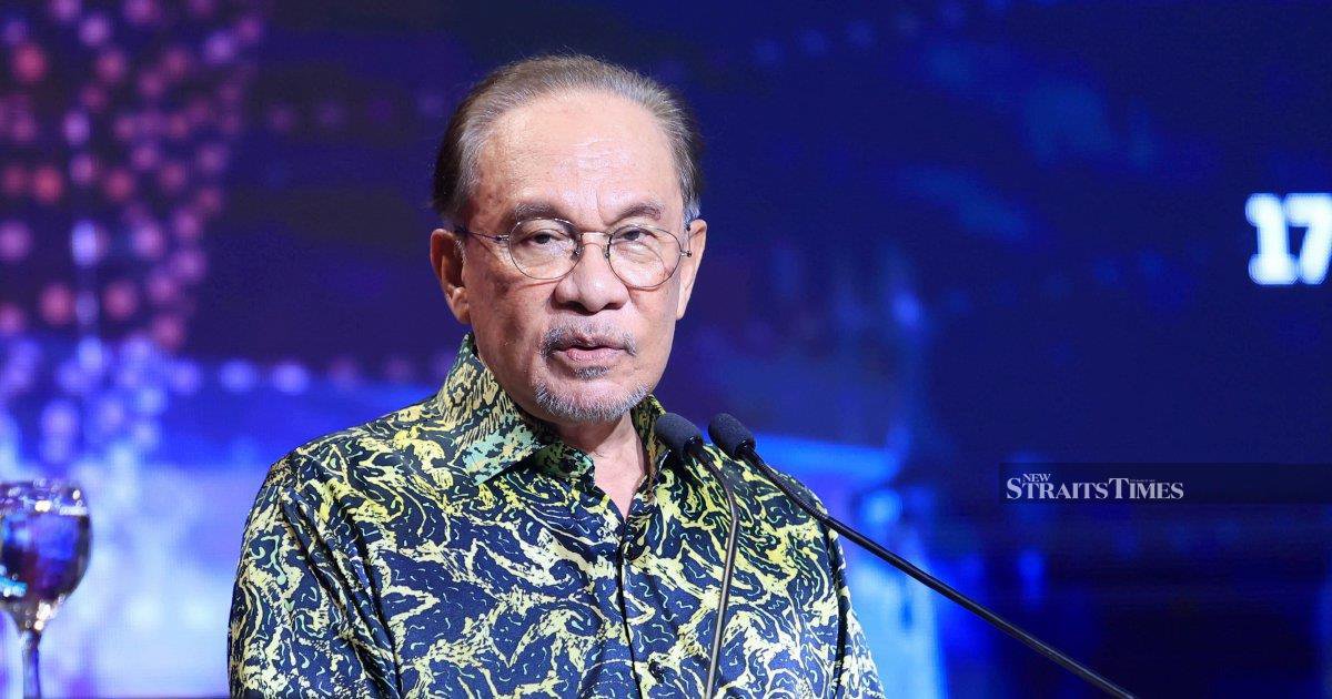 PM Anwar Ibrahim Completes Hernia Surgery, Remains in Hospital Care