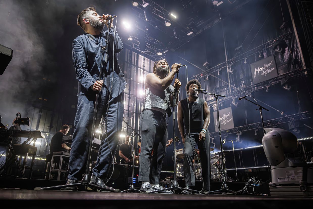 Massive Attack detained and questioned by Singapore police after Palestinian flag displayed at concert