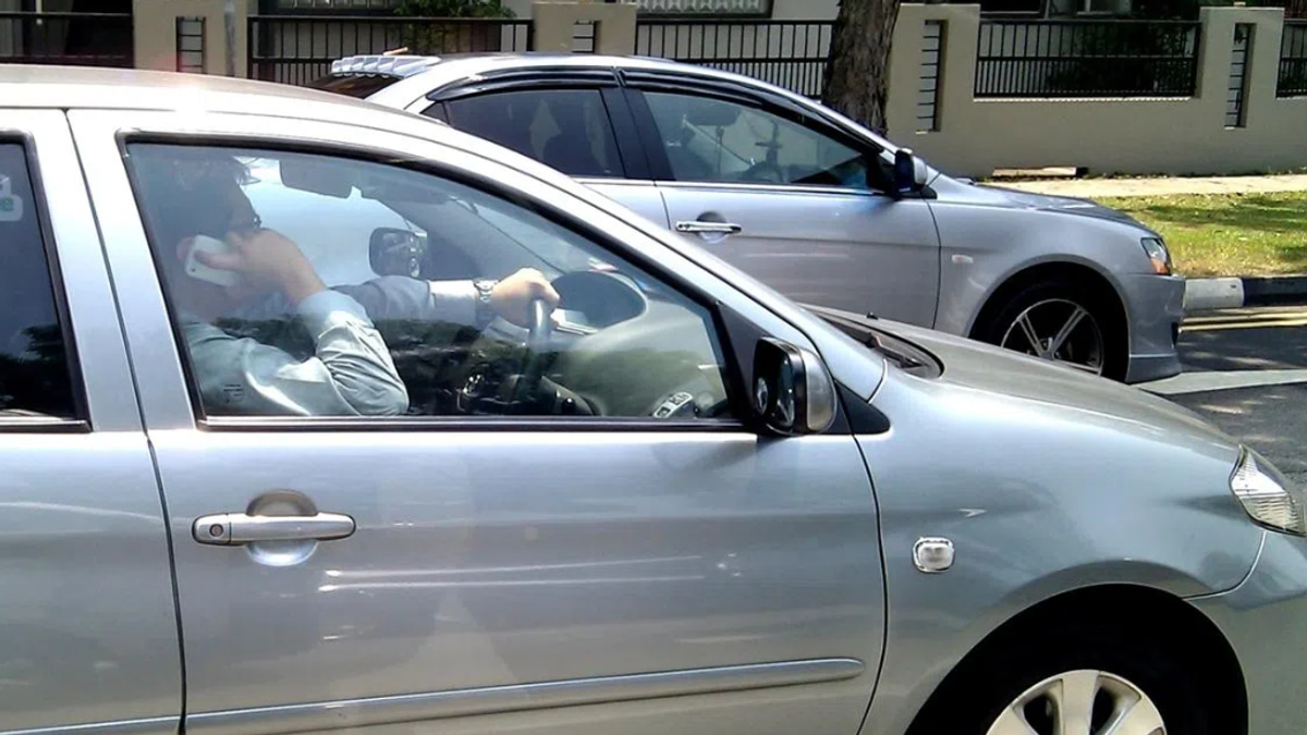 Singapore to Jail Drivers Merely Holding Phones, Toughen Penalties for Dangerous Driving