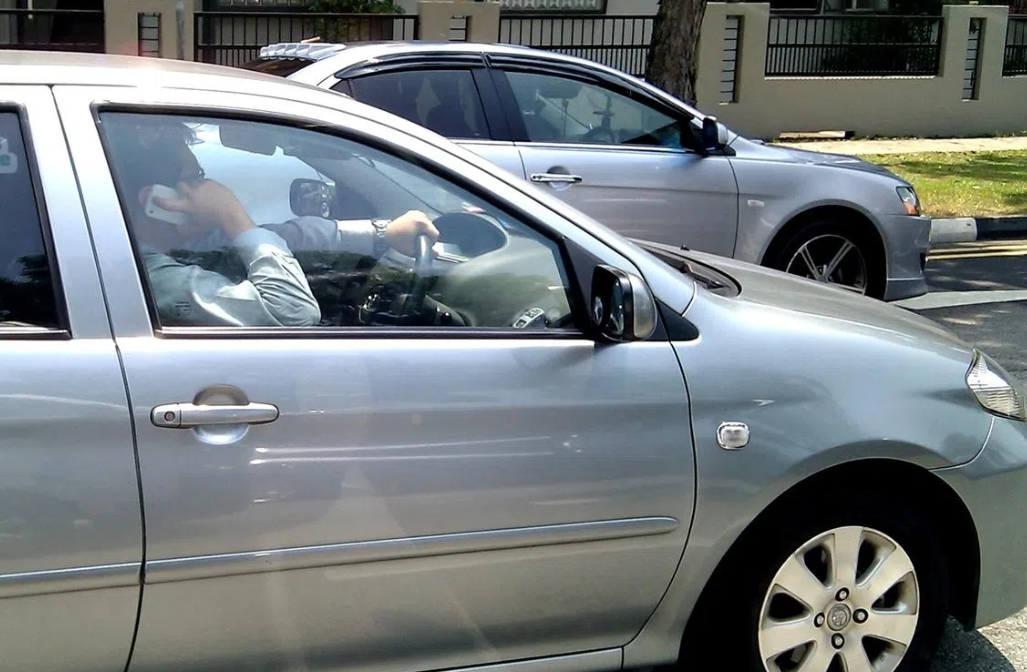 Singapore to Jail Drivers Merely Holding Phones, Toughen Penalties for Dangerous Driving