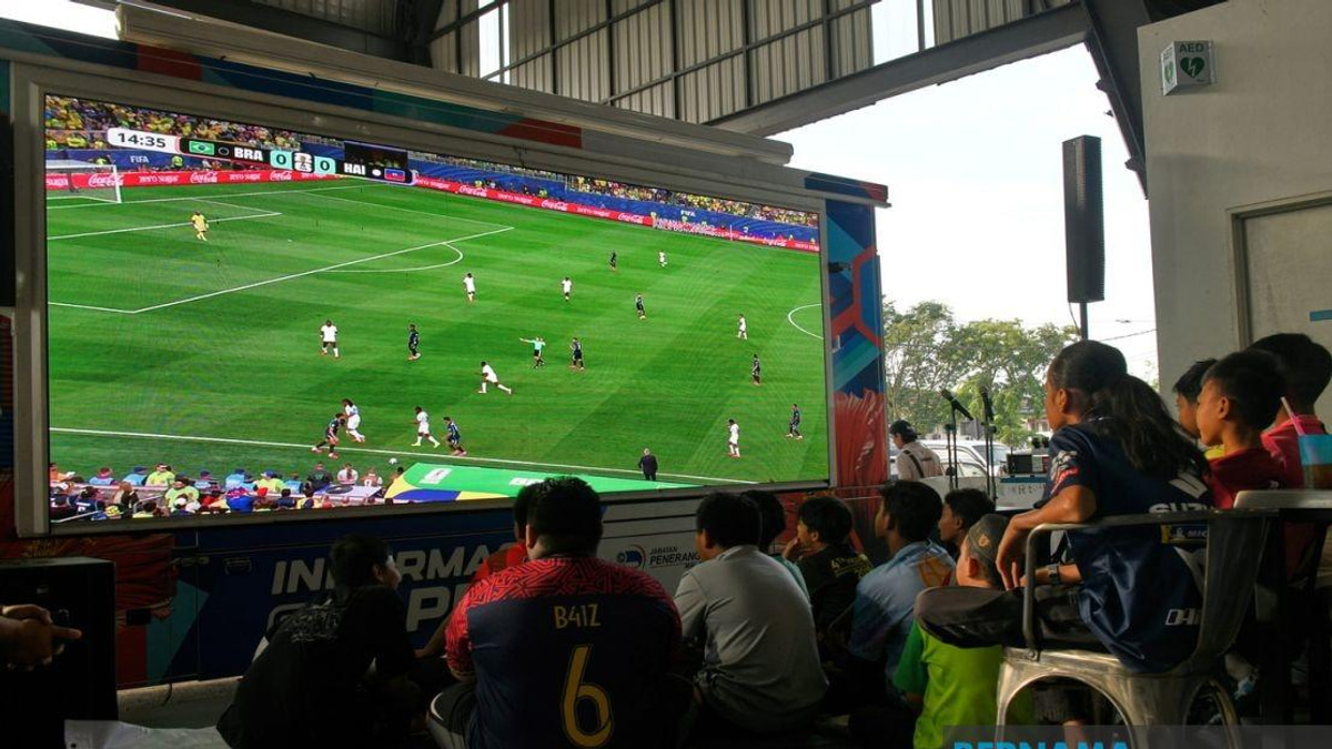 Free World Cup Broadcasts Ease Financial Burden on Malaysian Traders and Families