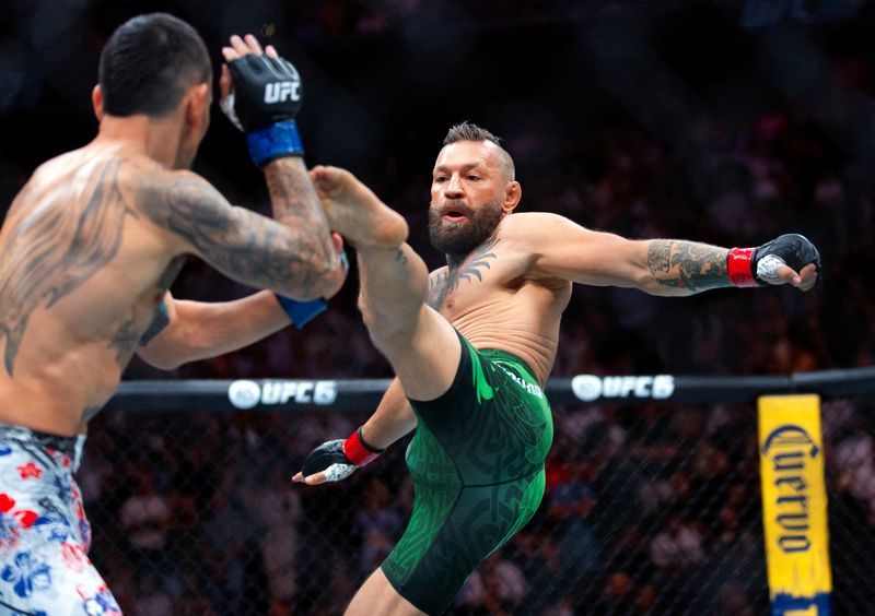 McGregor Vows to Return After Freak Knee Injury Ends Comeback Fight in 69 Seconds