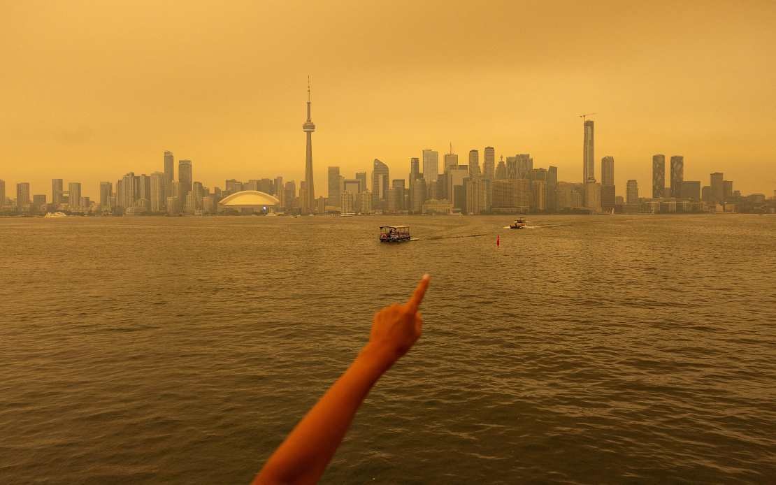 Ontario Wildfires Blanket Canada's Major Cities in Thick Smog, Disrupt Rail Networks