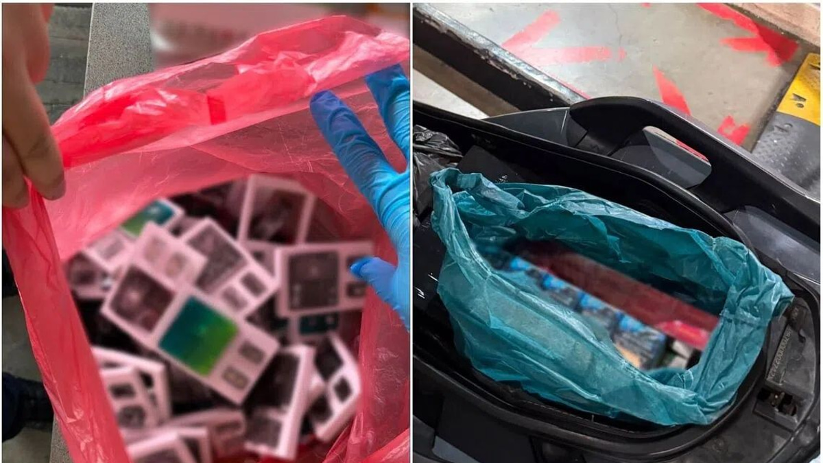 Two motorcyclists arrested for smuggling cigarettes and vapes at Singapore's Woodlands Checkpoint