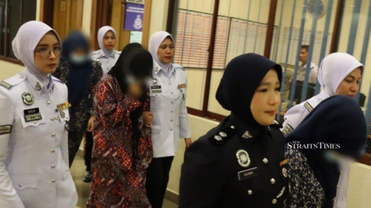 Three women, two teenagers, face court over dangerous 'Superman' motorcycle stunts in Kuantan